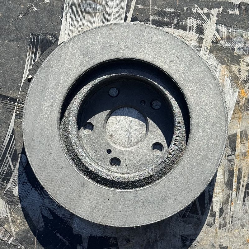 Brake rotor after laser rust removal, bare metal