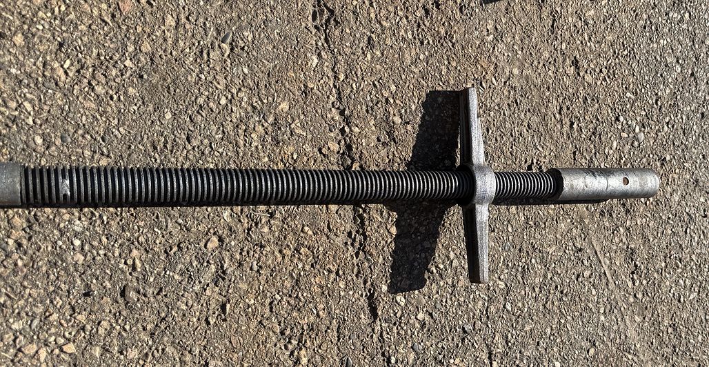 Threaded screw jack after laser rust removal, bare metal